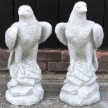 A pair of cast stone eagles