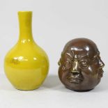 A Buddha and a vase