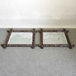 A pair of Chinese wall mirrors