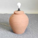 A terracotta table lamp