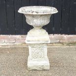 A garden urn on pedestal