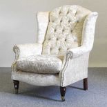 An upholstered armchair