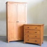 An oak wardrobe and chest