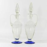 A pair of Venetian glass ewers