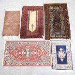 A collection of woollen rugs