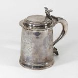 A Queen Anne silver tankard