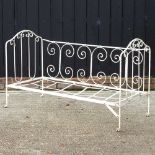 A metal day bed