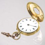 A gold fob watch