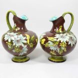 A pair of Doulton ewers