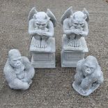 Four stone figures
