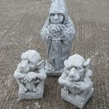 Three garden statues