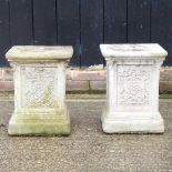 A pair of garden pedestals