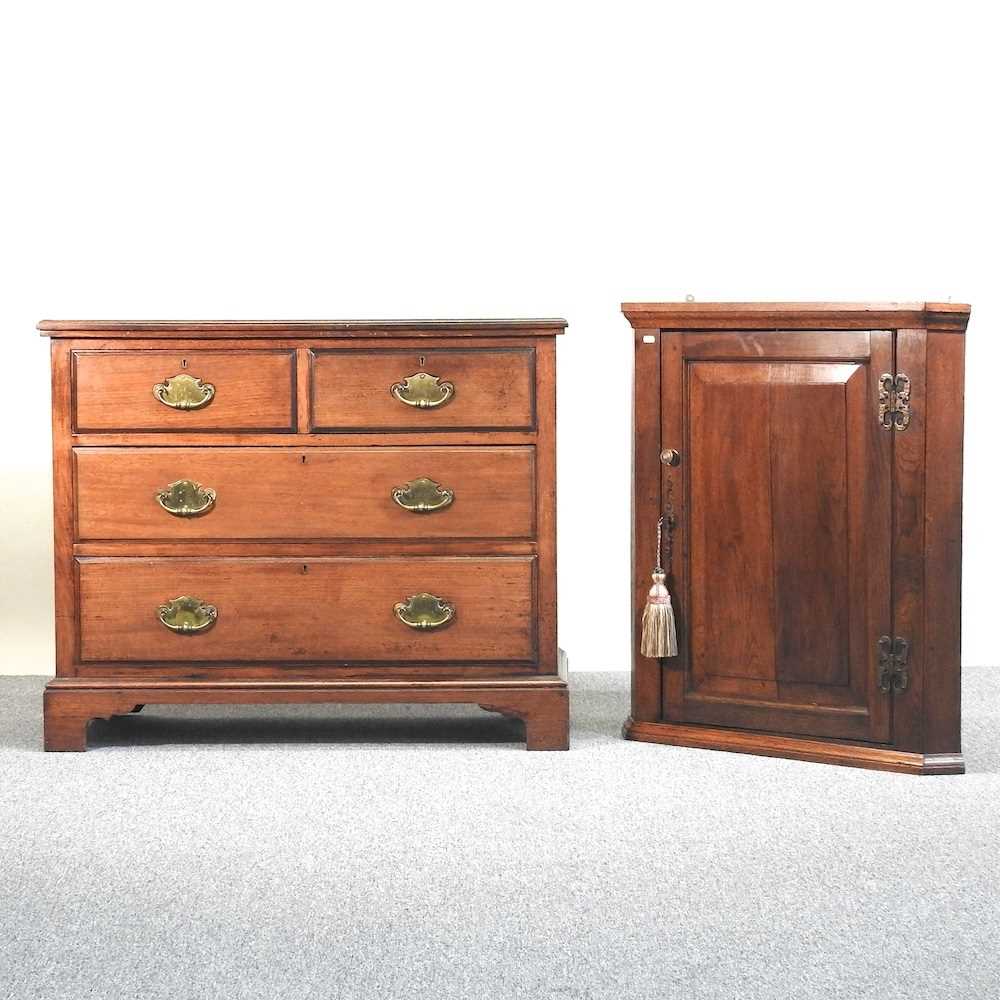 A chest and a corner cupboard