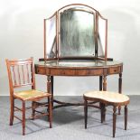 A dressing table, stool and chair