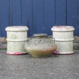 A pair of chimney pots and an urn