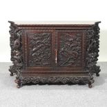 A Chinese carved cabinet