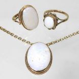 Two opal rings and a brooch