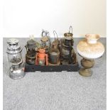 A collection of oil lamps