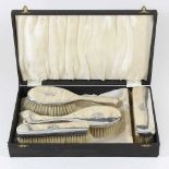 A silver dressing table set set