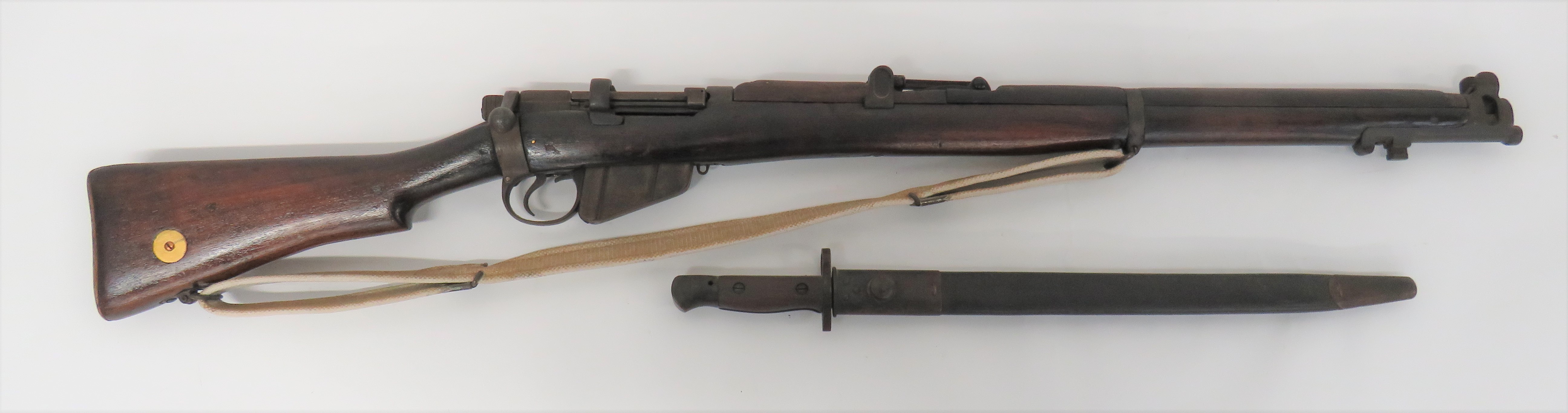 Deactivated 1916 Dated SMLE MKIII Rifle .303, 25 1/4 inch barrel.  Top mounted leaf sight.  Action