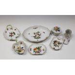 A collection of Herend porcelain comprising a heart shaped bonbonnière; an oval dish painted with