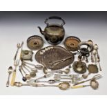 A large collection of silver plate comprising a pair of pierced wine coasters; repoussé tray