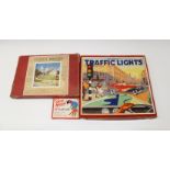 A vintage boxed LOTT'S BRICKS (Box A) model construction set together with a boxed Traffic Lights
