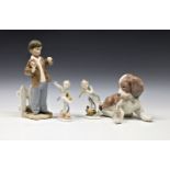 A collection of lladro and Nao figures