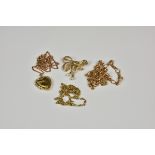 A small collection of 9ct gold jewellery to include a ribbon bow brooch with seed pearl drops;