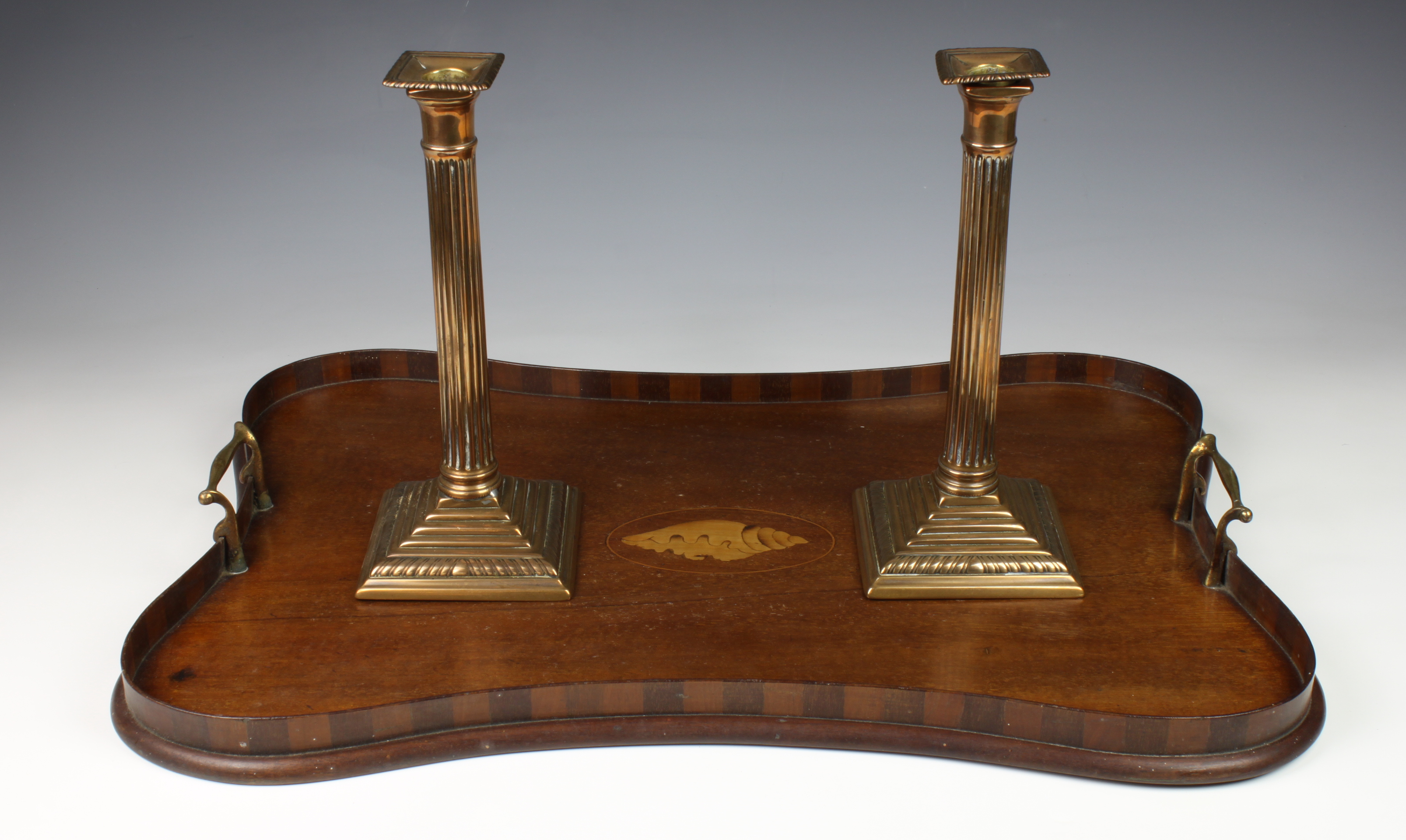 An Edwardian mahogany inlaid tray English circa 1900, of shaped form with twin brass carrying