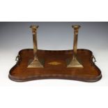 An Edwardian mahogany inlaid tray English circa 1900, of shaped form with twin brass carrying