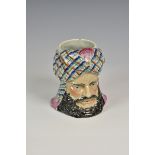 A 19th century Staffordshire Turk's head tobacco jar lacks cover, 6in. (15.25cm.) high.