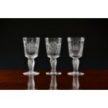 Three Minton Royal commemorative cut glass goblets issued by Peter Jones of Wakefield, one for the