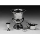 A silver plated urn form wine cooler 8¾in. (22.2cm.) high; together with a silver plated cream jug