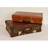 A vintage brown leather suitcase together with a further suitcase by Revelation. (2).