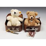 Steiff Fynn and Lotte teddy bears both contained in the original suitcase, Fynn in buff mohair,