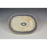 A large P.B & Co oval meat platter having stylised coloured border, 21 3/8in. (54.2cm.) long.