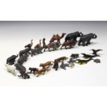 A collection of vintage cast metal cold painted toy animal figures comprising Elephants; Buffalos;