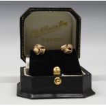 A pair of 9ct gold knot earrings comes in Paint & Sons retail box, 0.75g.