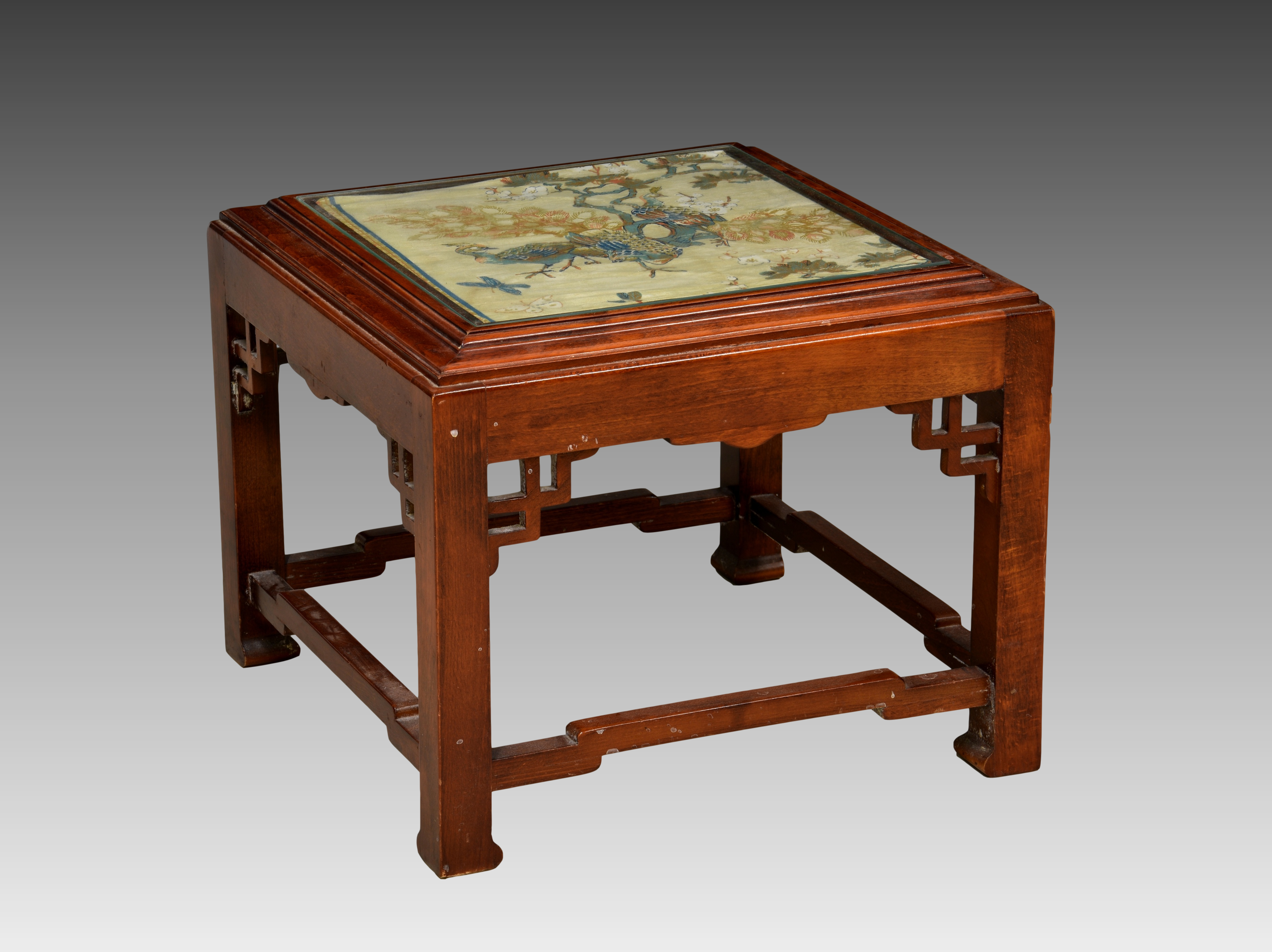 An Oriental stained beechwood occasional table second half 20th century, the top