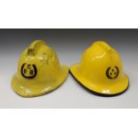 Two vintage Guernsey Fire Brigade helmets. (2)