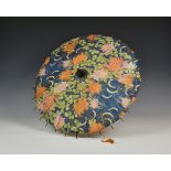 An antique Oriental style child's parasol early 20th century, with bamboo shaft and polychrome