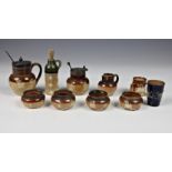 A collection of Doulton Lambeth miniature stoneware