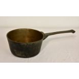 A vintage heavy brass cooking / saucepan, 24cm. diameter.