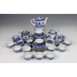 A blue and white Willow pattern childs miniature dinner service the majority early 20th century,