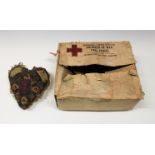 A World War II Red Cross parcel and a Royal Artillery sweetheart cushion. (2)