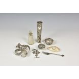 A small collection of antique collectable silver comprising a pierced conical posy holder by Henry