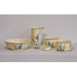 A Kirklands (Etruria) Limited wash jug and bowl / bedroom set decorated with flowers on white