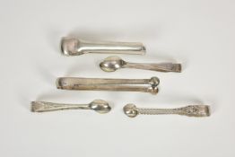 A collection of various silver sugar tongs comprising a George III pair of slender form with round