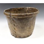 A 19th century rawhide / pig skin Mill bucket having stitched sides and scratched date 'XVII' to rim